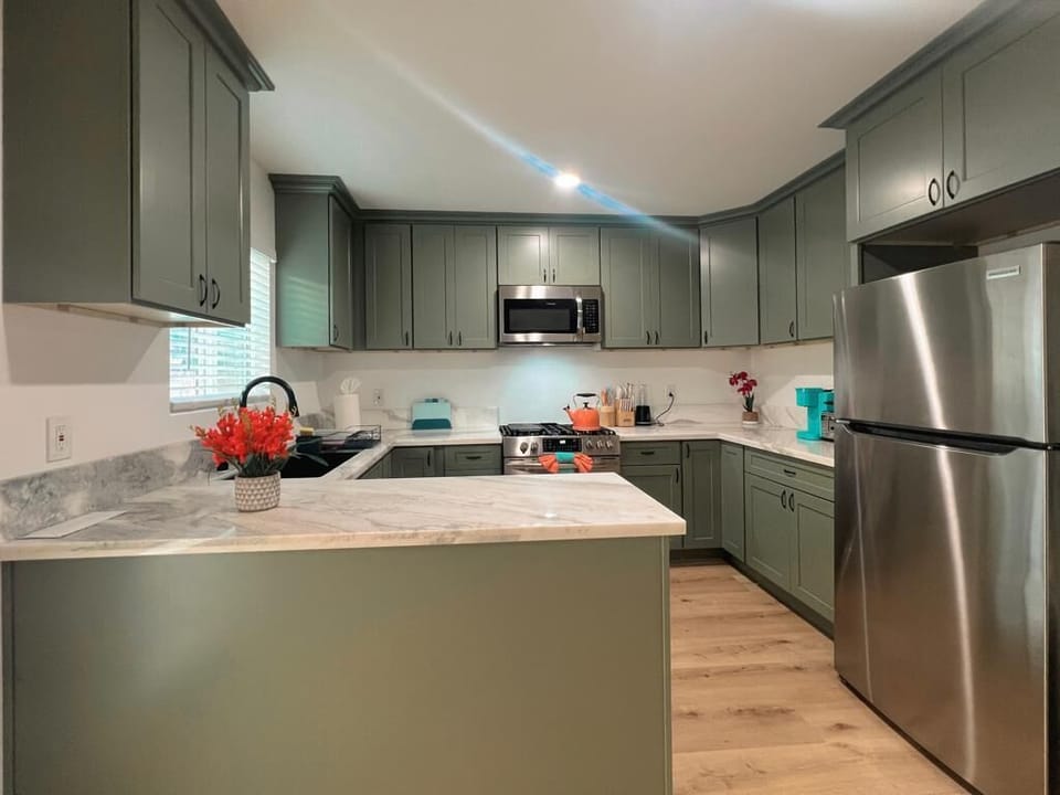 We have a fridge to store your food and a dishwasher too