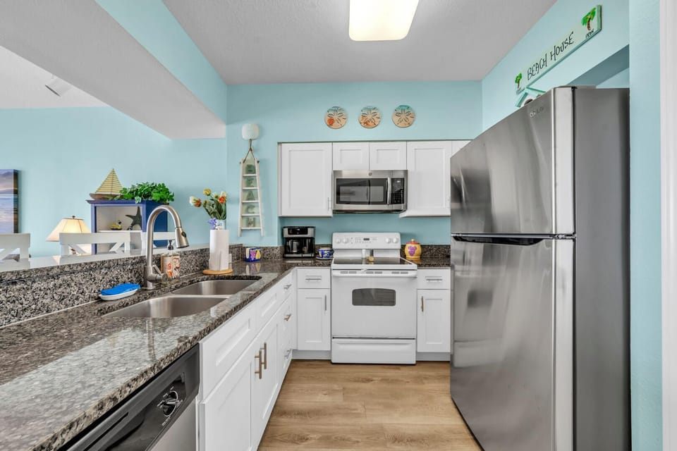 Well equipped w/new fridge/icemaker, stove, microwave, dishwasher, stone counter