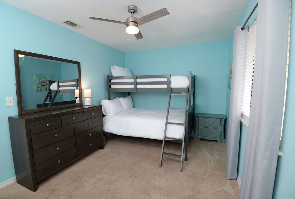 Second bedroom with full bed and twin bunk