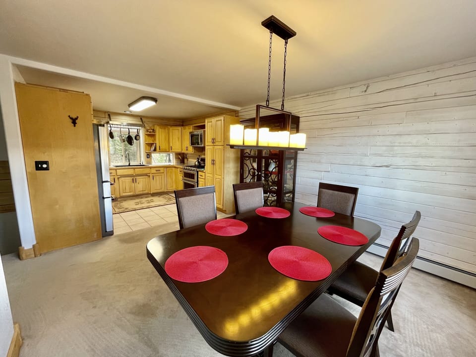 The open concept Dining Room and Kitchen  make relaxing with your loved ones a breeze