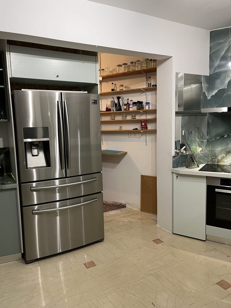 Extra large kitchen with large pantry, large Four-door refrigerator with beverage drawer, armoire doors with automatic ice and filtered water, and freezer.