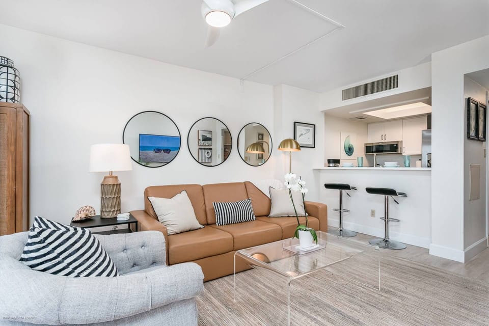 Fabulous living room with leather sofa sleeper for 2.  Cable TV, Smart TV included
