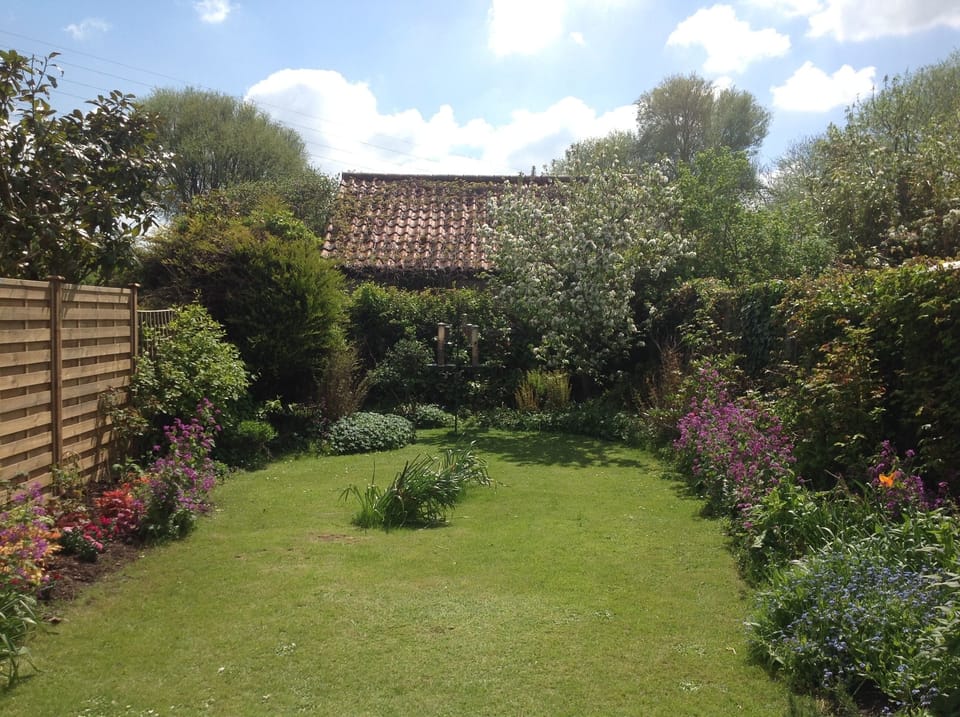 The garden is a lovely place to sit and eat in sunny weather.