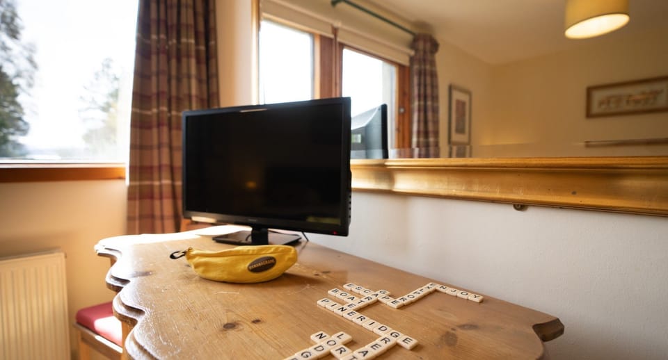 Pine Ridge Lodge TV in bedroom