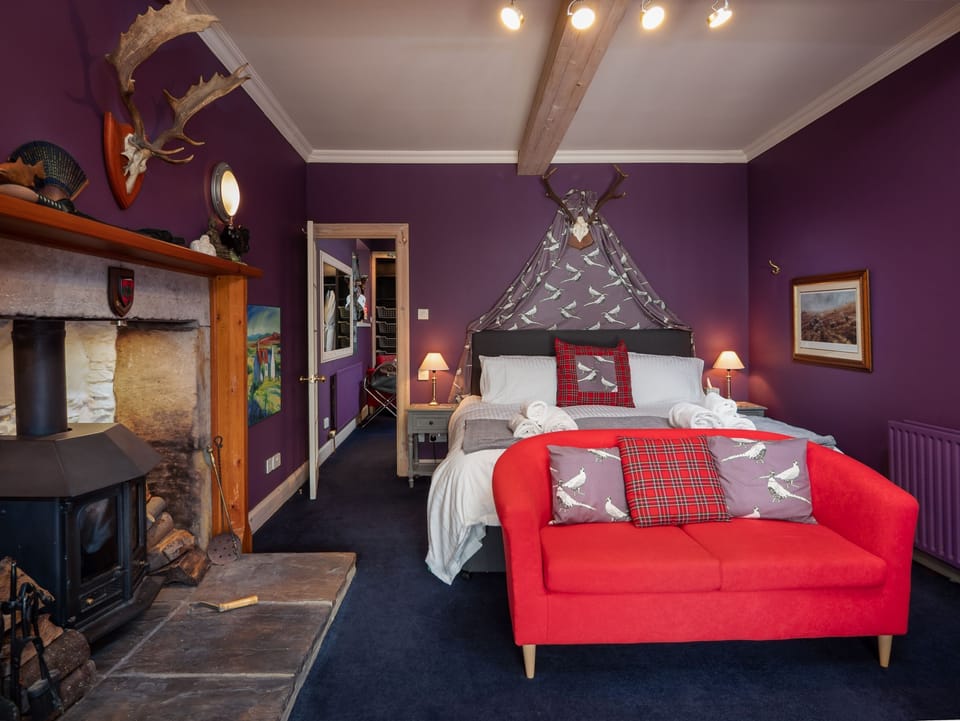 River House Garden Rooms bedroom with sofa