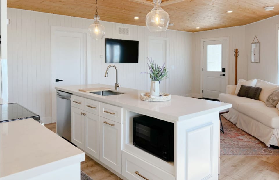 Bright and airy open concept kitchen and living space. 