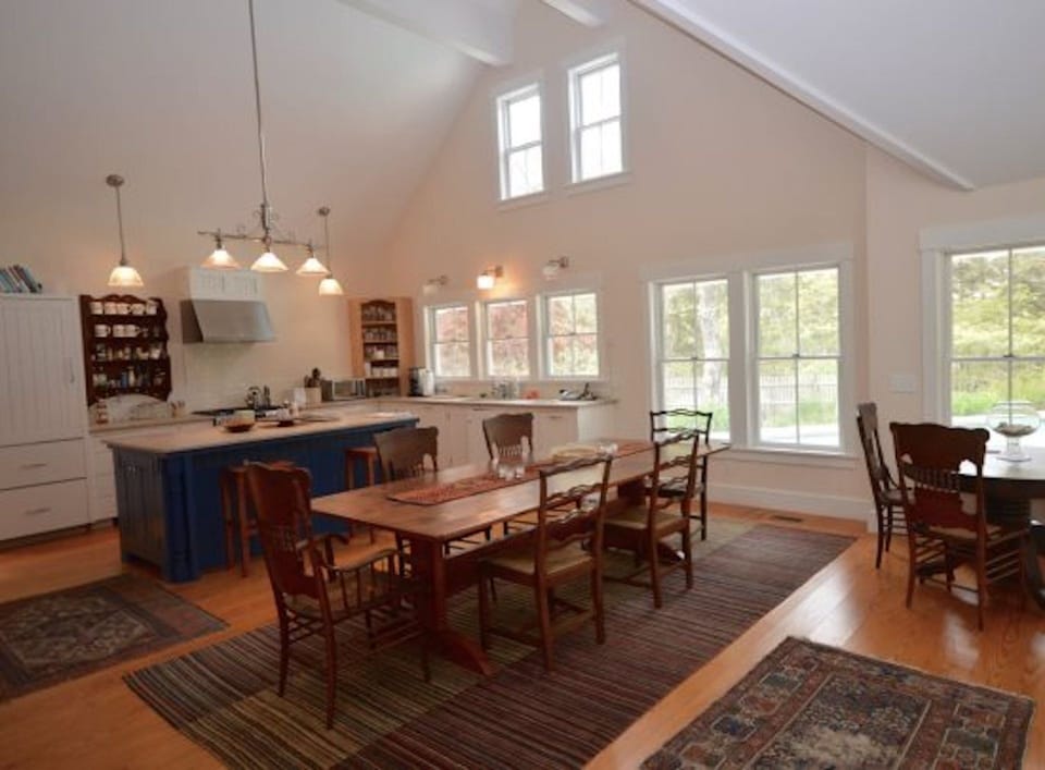 Open kitchen/dining/living room- sliders to back deck and pool