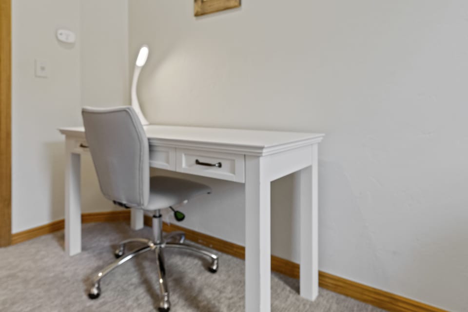 Unleash your productivity at the cozy work desk.