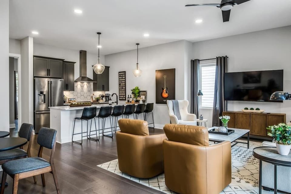 Modern open-concept space blending the kitchen and lounge.
