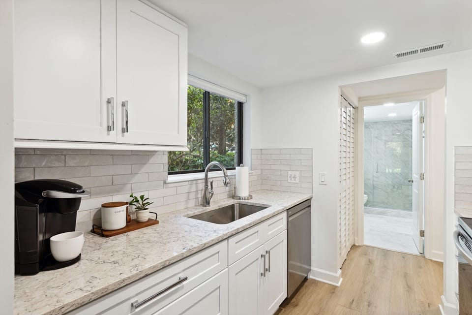 Kitchen receptacles adjacent to sink accept USB and type "A" charging cords