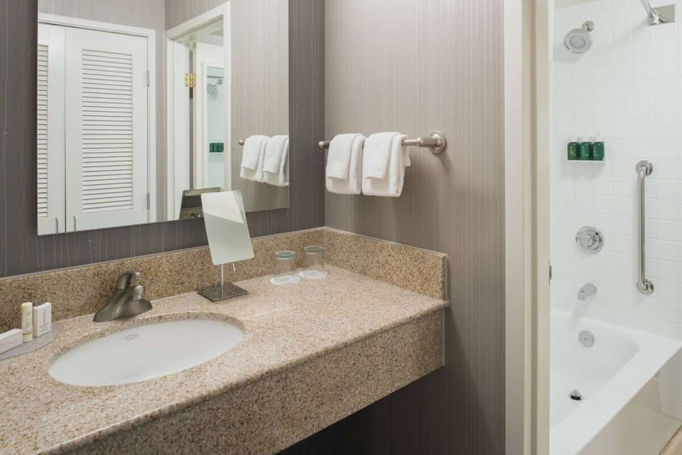 Full bathroom with a shower/tub. Basic toiletries and towels are provided