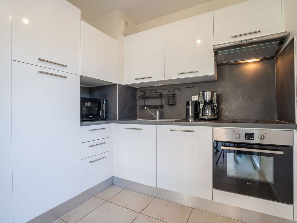 Plant, Furniture, Sky, Property, Table, Building, Cloud, Window, Chair, Outdoor Furniture