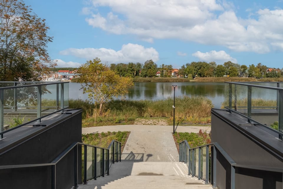 A view of the nearby waterfront, offering tranquil surroundings and a beautiful landscape.