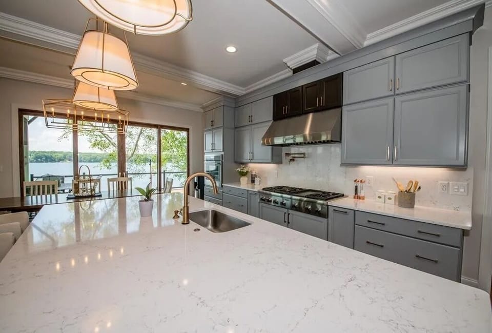 Thermador gas range, refrigerator, and appliances. Plus, pot filler, touch kitchen faucet, massive island workstation. Truly a chef's dream kitchen.