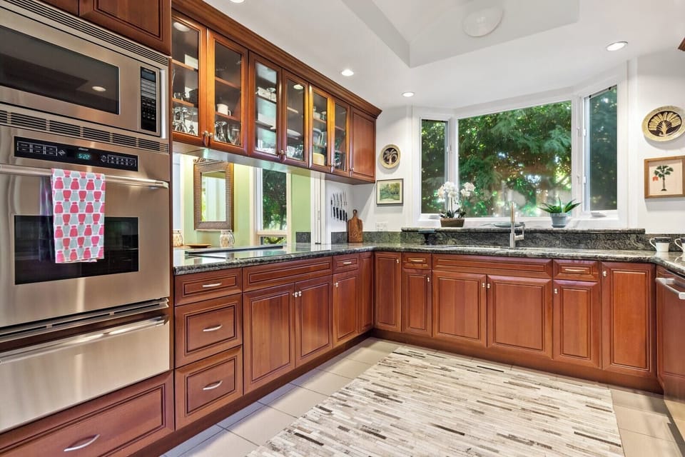 Share fresh flavors and island stories around this beautifully designed kitchen-dining retreat