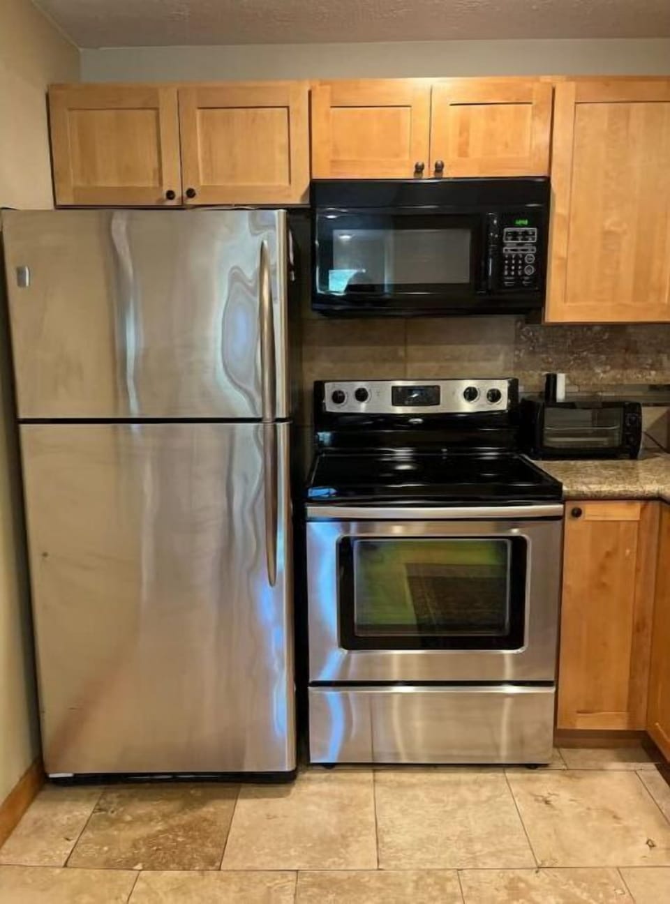 Full size refrigerator & freezer & ice maker.  Microwave, Stove & Oven.