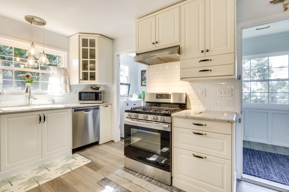 Kitchen | Keyless Entry | Spacious Yard w/ Tropical Gardens