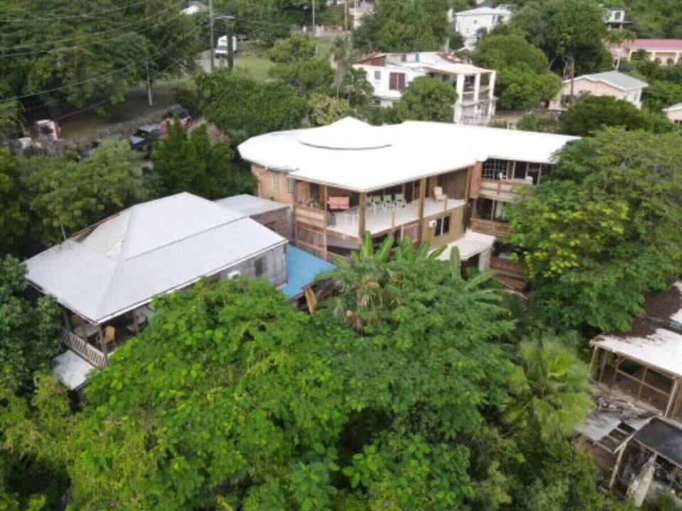 Charming villa surrounded by lush greenery, offering tranquility and comfort.