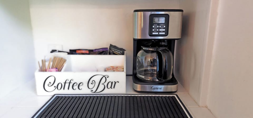 Coffee maker and essentials.