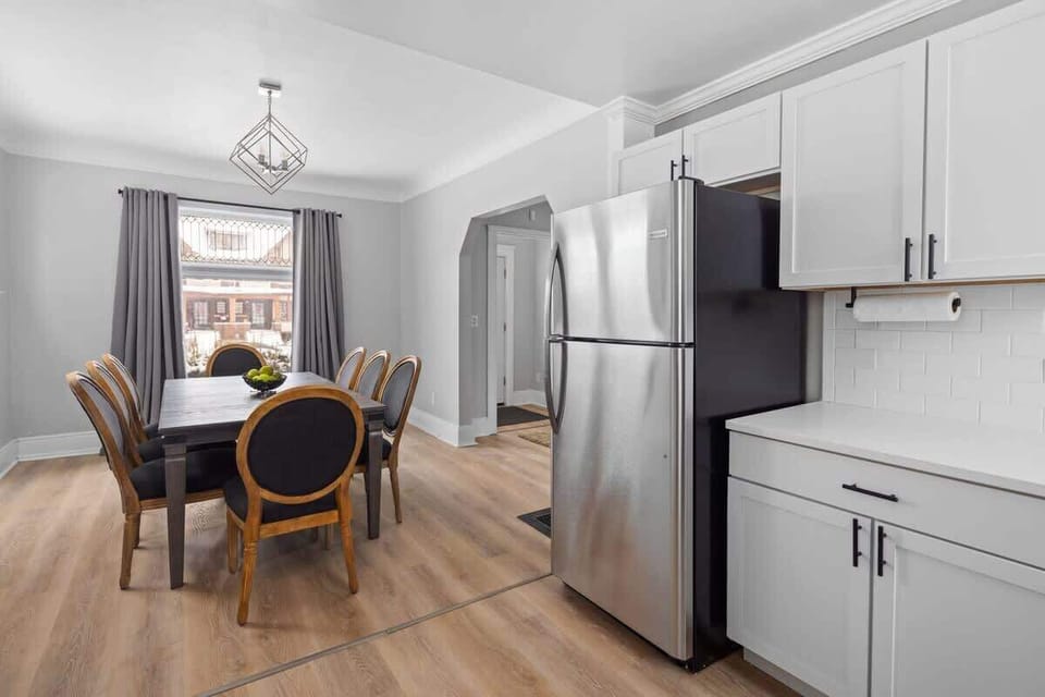 Dining area flowing seamlessly into the fully equipped kitchen.