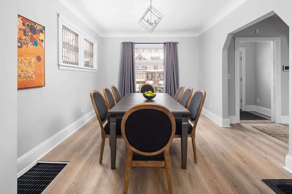 Spacious dining area with seating for eight guests.