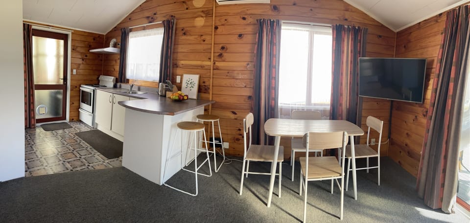 Open plan kitchen, dining and lounge, which flows onto front deck