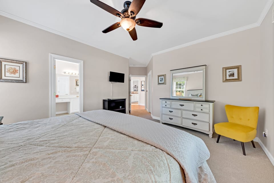 Access the full first floor bath from the primary bedroom and the hall