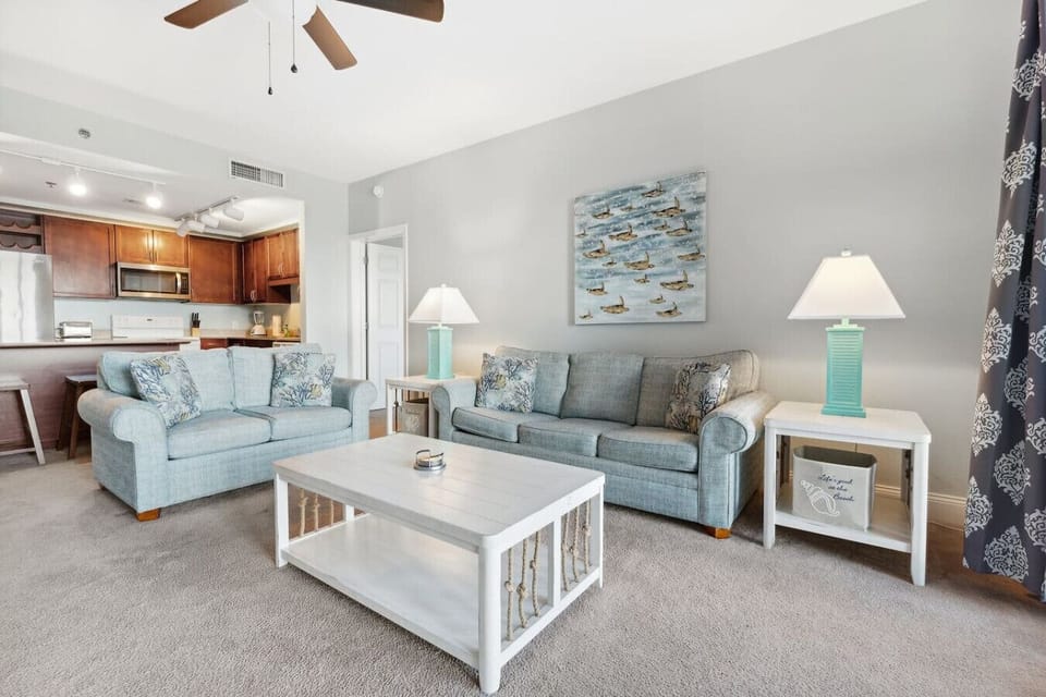 Cozy Living Area with Flat Screen TV, Sleeper Sofa and Balcony Access