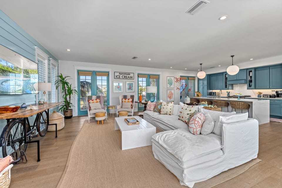 Sink into plush seating that's perfect for family movie night after an island day.