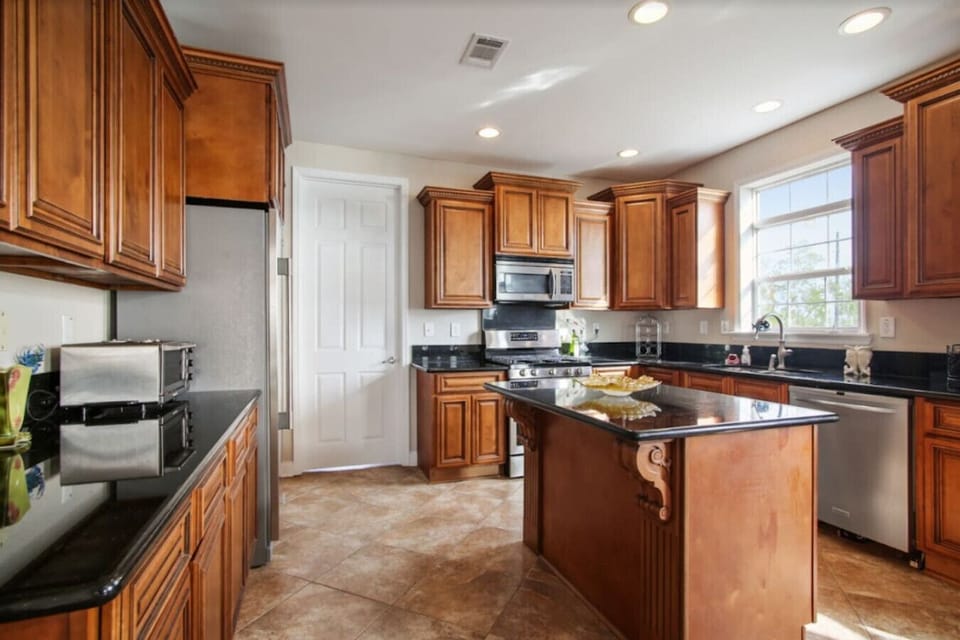 Updated kitchen with stainless steel appliances and new cabinetry