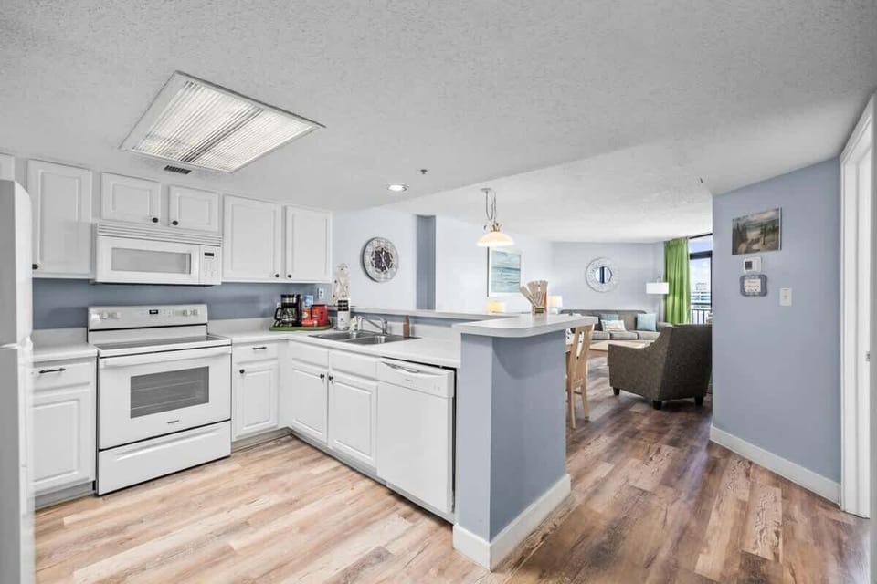 Fully stocked kitchen with everything you need for home-cooked meals by the beach.

