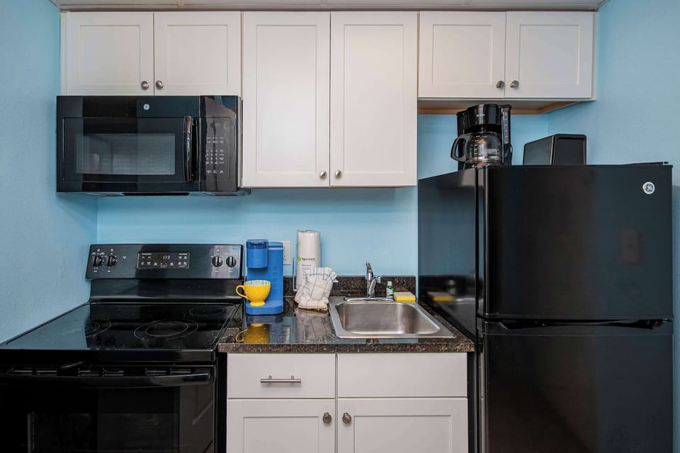 Enjoy the convenience of a kitchen stocked with cookware and utensils.