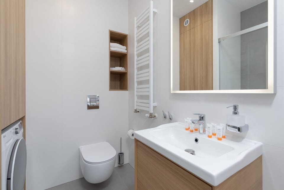 Comfortable bathroom with hairdryer. 