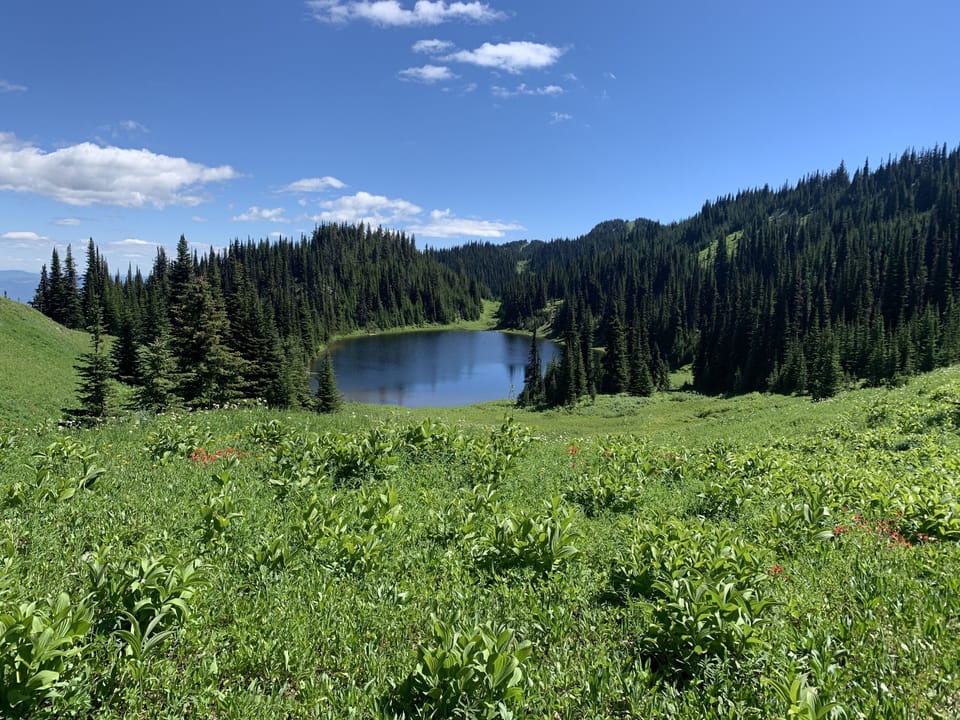 Hike to the top of the mountain and go for a swim!