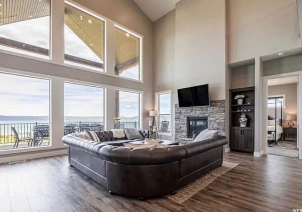 Main living room area on the main floor with huge windows and an amazing view!