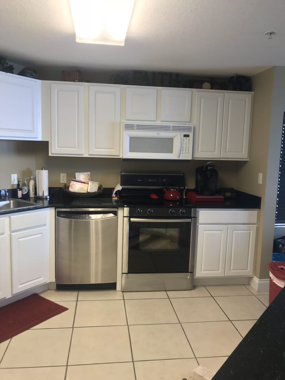 Well appointed kitchen with large refrigerator 