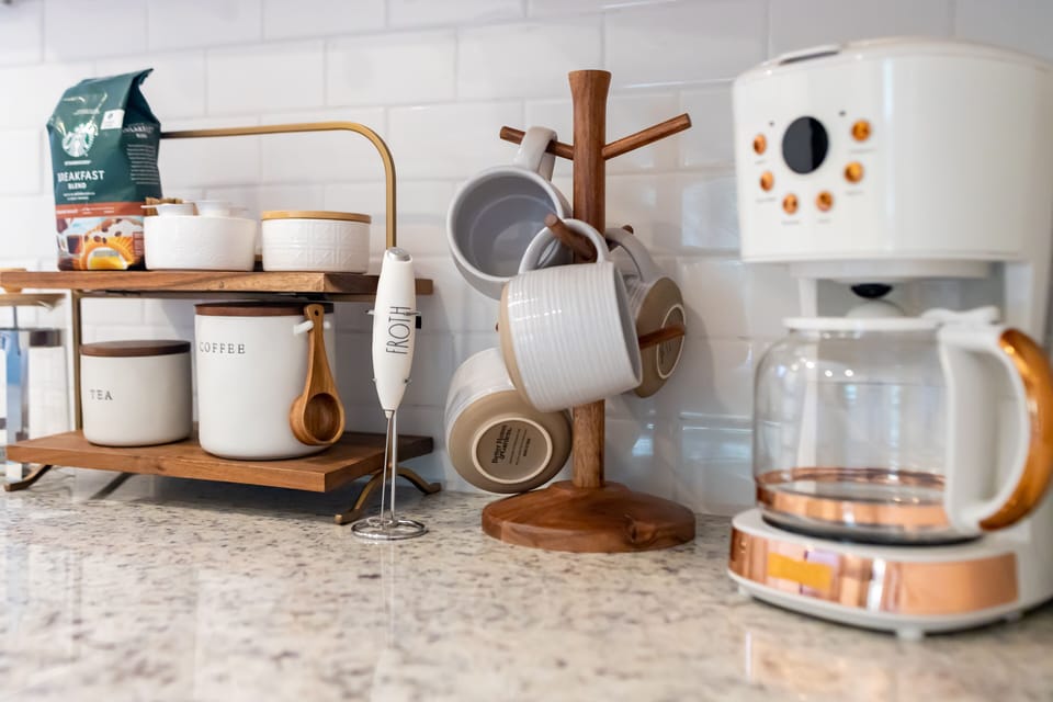 Fully stocked coffee bar with beans, tea, cream and sugar. Make your traditional coffee cup or use our french press and milk frother.