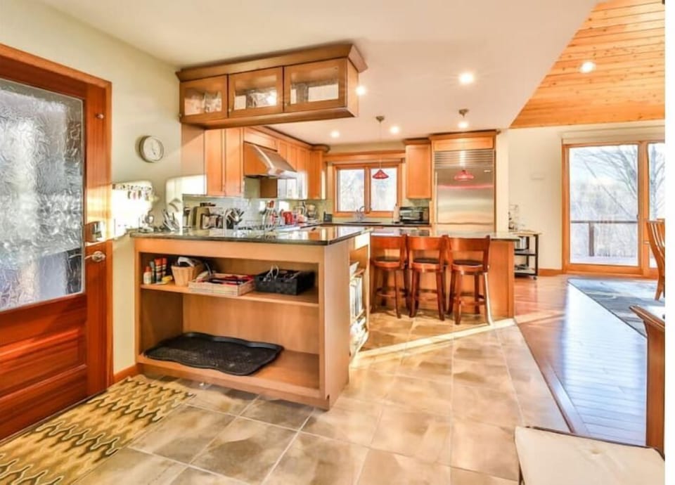 entry way with storage for groceries and ski boots