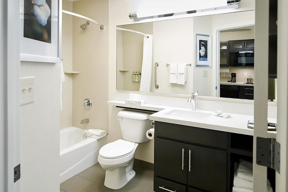 Start your day easily with a roomy vanity and fresh towels.