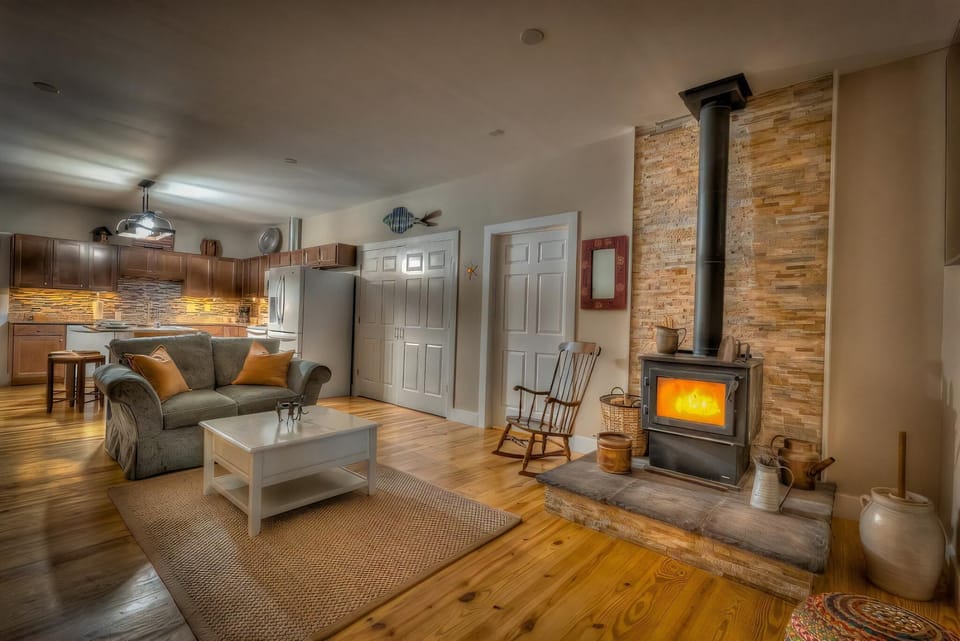 Living room with wood burning fireplace