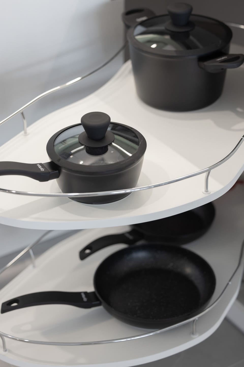 A drawer with neatly organized cookware, ensuring functionality and ease of use for meal preparation.
