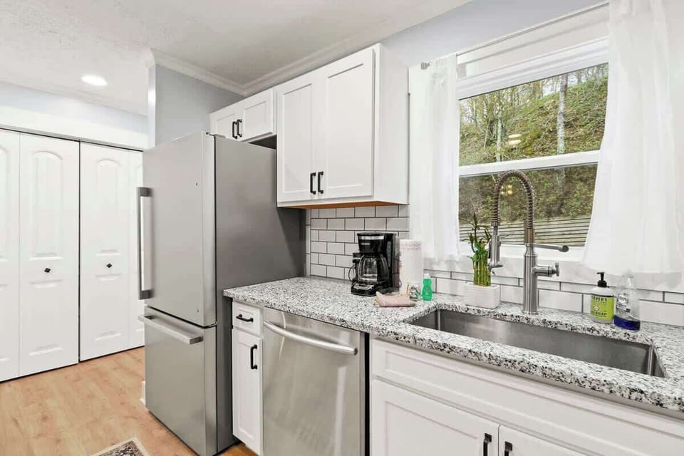 "Effortless order and charm: a kitchen radiating cleanliness and organization, inviting a sense of calm and functionality to your culinary space.