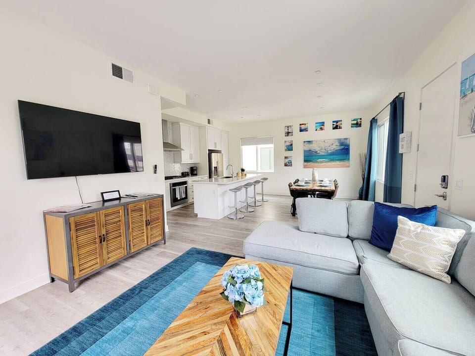 Unwind in style in this spacious and beautifully decorated living room, the perfect place to kick back and relax after a day of exploring San Diego