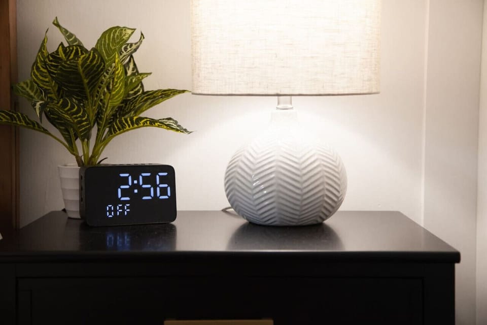 Every detail is designed for comfort, from soft lighting to USB chargers and calming tones that help you unwind after a day exploring the lake and wineries.