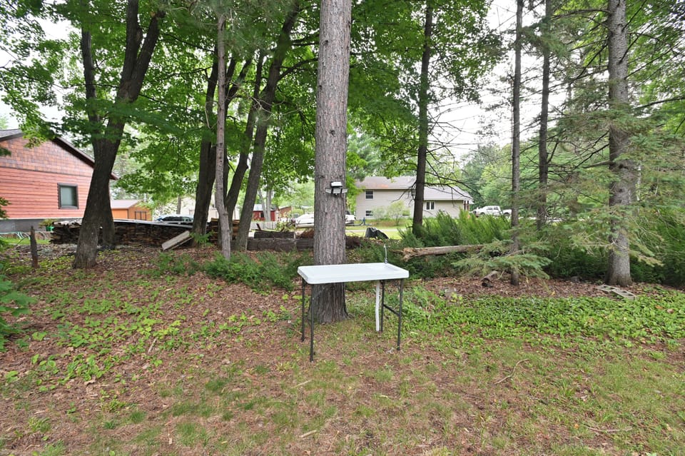 Fish cleaning station. Hose located next to wood shed.