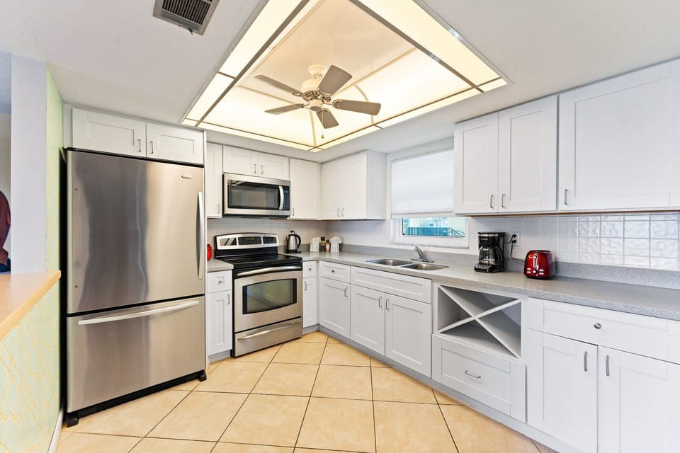 A bright, fully equipped kitchen makes cooking effortless and enjoyable.