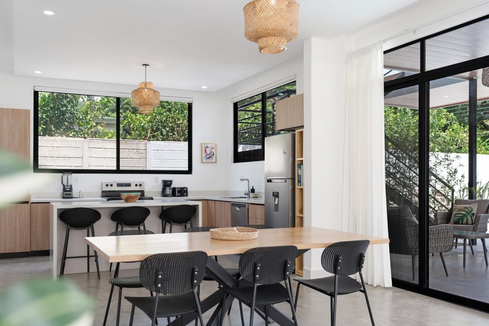 Open concept kitchen and living area with large sliding doors to patio!