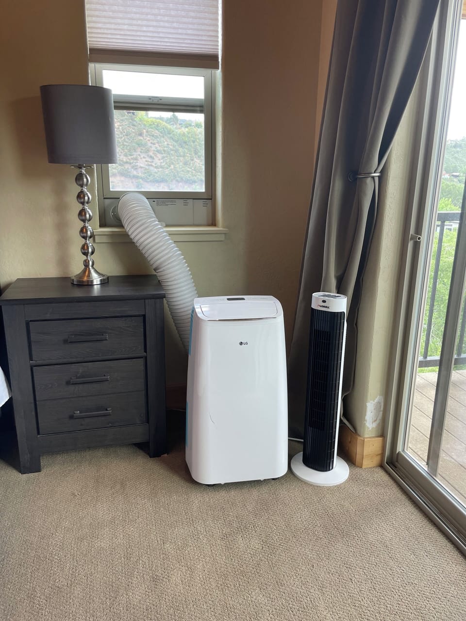 Portable A/C & tower fan for added comfort (Yes, there is central AC)