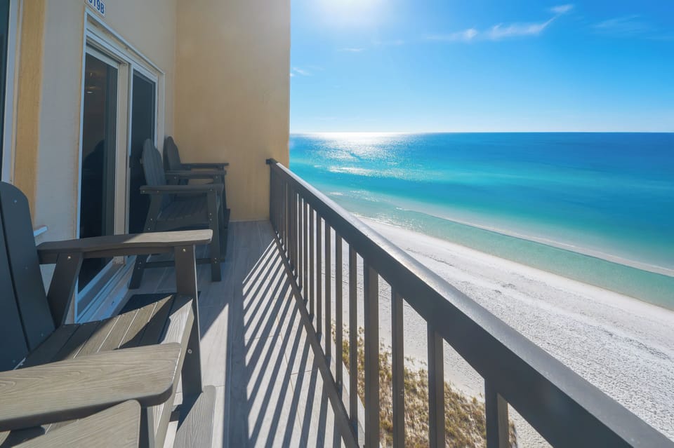 Balcony view with four captain chairs. 