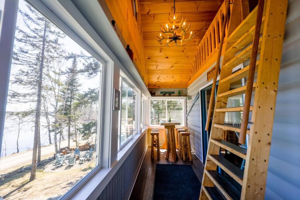 Ascend to new heights of tranquility on our upper deck, where a wooden ladder beckons you to escape and explore.
